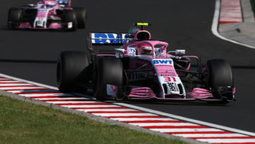 BUDAPEST, HUNGARY - JULY 29: Esteban Ocon of France driving the (31) Sahara Force India F1 Team VJM11 Mercedes leads Sergio Perez of Mexico and Force India on track during the Formula One Grand Prix of Hungary at Hungaroring on July 29, 2018 in Budapest, Hungary. (Photo by Charles Coates/Getty Images)