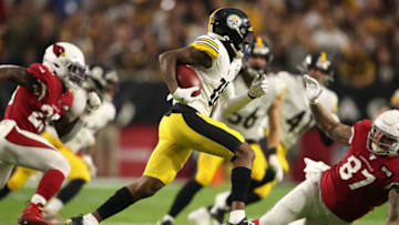 GLENDALE, ARIZONA - DECEMBER 08: Wide receiver Diontae Johnson #18 of the Pittsburgh Steelers carries the football en route to scoring on a 85 yard punt return touchdown against the Arizona Cardinals during the first half of the NFL game at State Farm Stadium on December 08, 2019 in Glendale, Arizona. (Photo by Christian Petersen/Getty Images)