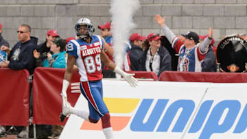 MONTREAL, QC - OCTOBER 13: Duron Carter #89 of the Montreal Alouettes scores a touchdown in the first half during the CFL game against the Saskatchewan Roughriders at Percival Molson Stadium on October 13, 2014 in Montreal, Quebec, Canada. The Montreal Alouettes defeated the Saskatchewan Roughriders 40-9. (Photo by Minas Panagiotakis/Getty Images)