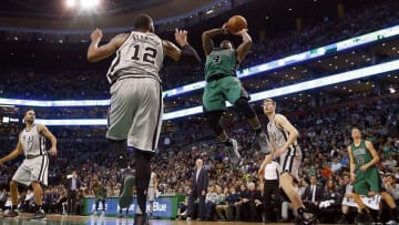 Nov 25, 2016; Boston, MA, USA; Boston Celtics guard Isaiah Thomas (4) goes up for a shot over San Antonio Spurs forward LaMarcus Aldridge (12) during the first half at TD Garden. Mandatory Credit: Winslow Townson-USA TODAY Sports