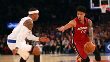 Nov 27, 2015; New York, NY, USA; Miami Heat guard Gerald Green (14) drives around New York Knicks forward Carmelo Anthony (7) during the first quarter at Madison Square Garden. Mandatory Credit: Anthony Gruppuso-USA TODAY Sports