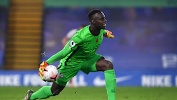 LONDON, ENGLAND - NOVEMBER 07: Edouard Mendy of Chelsea in action during the Premier League match between Chelsea and Sheffield United at Stamford Bridge on November 07, 2020 in London, England. Sporting stadiums around the UK remain under strict restrictions due to the Coronavirus Pandemic as Government social distancing laws prohibit fans inside venues resulting in games being played behind closed doors. (Photo by Ben Stansall - Pool/Getty Images)