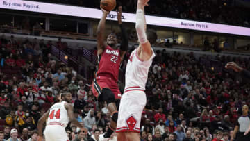 Miami Heat forward Jimmy Butler (22) shoots over Chicago Bulls center Nikola Vucevic (9)( David Banks-USA TODAY Sports)