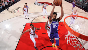 PORTLAND, OR - OCTOBER 12: Marvin Bagley III #35 of the Sacramento Kings dunks the ball against the Portland Trail Blazers during a pre-season game on October 12, 2018 at Moda Center, in Portland, Oregon. NOTE TO USER: User expressly acknowledges and agrees that, by downloading and/or using this Photograph, user is consenting to the terms and conditions of the Getty Images License Agreement. Mandatory Copyright Notice: Copyright 2018 NBAE (Photo by Sam Forencich/NBAE via Getty Images)