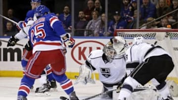 Feb 12, 2016; New York, NY, USA; New York Rangers left wing Viktor Stalberg (25) scores a goal past Los Angeles Kings goalie Peter Budaj (31) during the first period at Madison Square Garden. Mandatory Credit: Adam Hunger-USA TODAY Sports