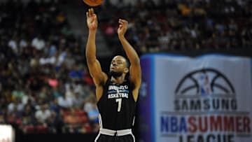 Jul 10, 2015; Las Vegas, NV, USA; Minnesota Timberwolves guard Lorenzo Brown (7) shoots the ball during an NBA Summer League game against the Los Angeles Lakers at Thomas & Mack Center. Minnesota won the game 81-68. Mandatory Credit: Stephen R. Sylvanie-USA TODAY Sports
