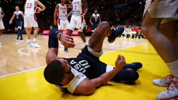 SYDNEY, AUSTRALIA - AUGUST 26: Jayson Tatum of the USA falls to the ground after being fouled during the International Friendly Basketball match between Canada and the USA at Qudos Bank Arena on August 26, 2019 in Sydney, Australia. (Photo by Mark Kolbe/Getty Images)