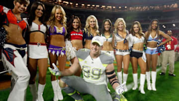 GLENDALE, AZ - JANUARY 25: Team Carter defensive end J.J. Watt #99 of the Houston Texans poses with cheerleaders after the 2015 Pro Bowl at University of Phoenix Stadium on January 25, 2015 in Glendale, Arizona. (Photo by Christian Petersen/Getty Images)