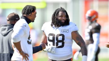 BEREA, OHIO - AUGUST 18: Defensive tackle Sheldon Richardson #98 of the Cleveland Browns talks with teammates during NFL training camp on August 18, 2020 at the Browns training facility in Berea, Ohio. (Photo by Jason Miller/Getty Images)