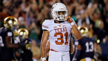SOUTH BEND, IN - SEPTEMBER 05: Jason Hall #31 of the Texas Longhorns reacts after a Notre Dame Fighting Irish touchdown during the fourth quarter at Notre Dame Stadium on September 5, 2015 in South Bend, Indiana. The Notre Dame Fighting Irish won 38-3. (Photo by Jon Durr/Getty Images)