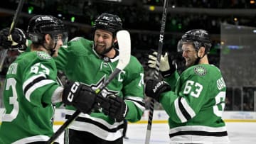 Apr 19, 2023; Dallas, Texas, USA; Dallas Stars right wing Evgenii Dadonov (63) and left wing Jamie Benn (14) and center Wyatt Johnston (53) celebrates a goal scored by Dadonov against the Minnesota Wild during the second period in game two of the first round of the 2023 Stanley Cup Playoffs at American Airlines Center. Mandatory Credit: Jerome Miron-USA TODAY Sports
