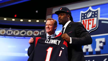 NEW YORK, NY - MAY 08: Jadeveon Clowney of the South Carolina Gamecocks stands on stage with NFL Commissioner Roger Goodell after he was picked #1 overall by the Houston Texansduring the first round of the 2014 NFL Draft at Radio City Music Hall on May 8, 2014 in New York City. (Photo by Elsa/Getty Images)