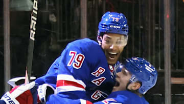 NEW YORK, NEW YORK - DECEMBER 12: Filip Chytil #72 of the New York Rangers celebrates his game winning overtime goal against the New Jersey Devils along with K'Andre Miller #79 at Madison Square Garden on December 12, 2022 in New York City. The Rangers defeated the Devils 4-3 in overtime (Photo by Bruce Bennett/Getty Images)