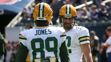 CHICAGO, IL - SEPTEMBER 13: Quarterback Aaron Rodgers #12 of the Green Bay Packers talks with James Jones #89 prior to the game against the Chicago Bears at Soldier Field on September 13, 2015 in Chicago, Illinois. (Photo by Jonathan Daniel/Getty Images)