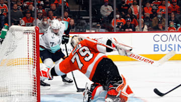 PHILADELPHIA, PENNSYLVANIA - OCTOBER 18: Carter Hart #79 of the Philadelphia Flyers makes the first period save on Jordan Eberle #7 of the Seattle Kraken at the Wells Fargo Center on October 18, 2021 in Philadelphia, Pennsylvania. (Photo by Bruce Bennett/Getty Images)