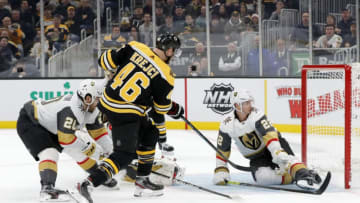 BOSTON, MA - JANUARY 21: Boston Bruins center David Krejci (46) scores the game winner besting Vegas Golden Knights defenseman Nick Holden (22) during a game between the Boston Bruins and the Vegas Golden Knights on January 21, 2020, at TD Garden in Boston, Massachusetts. (Photo by Fred Kfoury III/Icon Sportswire via Getty Images)