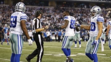 Jan 4, 2015; Arlington, TX, USA; Dallas Cowboys wide receiver Dez Bryant (88) argues a pass interference call with side judge Allen Baynes (56) that was called on linebacker Anthony Hitchens (59) in the fourth quarter against the Detroit Lions in the NFC Wild Card Playoff Game at AT&T Stadium. Mandatory Credit: Matthew Emmons-USA TODAY Sports