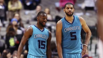 Dec 5, 2016; Dallas, TX, USA; Charlotte Hornets guard Kemba Walker (15) laughs with guard Nicolas Batum (5) during the second half against the Dallas Mavericks at American Airlines Center. Mandatory Credit: Kevin Jairaj-USA TODAY Sports