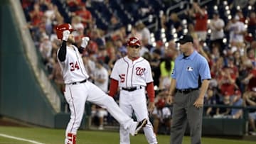 Apr 26, 2016; Washington, DC, USA; Washington Nationals right fielder Bryce Harper (34) celebrates after driving a run during the fifth inning against the Philadelphia Phillies at Nationals Park. Mandatory Credit: Tommy Gilligan-USA TODAY Sports