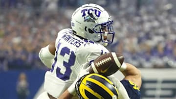 TCU linebacker Dee Winters (13) knocks away a pass from Michigan tight end Colston Loveland (18) during the second half.Syndication Arizona Republic