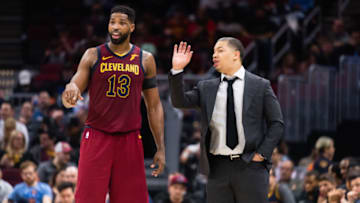 CLEVELAND, OH - APRIL 11: Tristan Thompson #13 talks with Tyronn Lue of the Cleveland Cavaliers during the second half against the New York Knicks at Quicken Loans Arena on April 11, 2018 in Cleveland, Ohio. The Knicks defeated the Cavaliers 110-98. NOTE TO USER: User expressly acknowledges and agrees that, by downloading and or using this photograph, User is consenting to the terms and conditions of the Getty Images License Agreement. (Photo by Jason Miller/Getty Images)