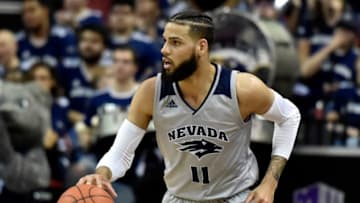 LAS VEGAS, NEVADA - MARCH 15: Cody Martin #11 of the Nevada Wolf Pack brings the ball up court against the San Diego State Aztecs during a semifinal game of the Mountain West Conference basketball tournament at the Thomas & Mack Center on March 15, 2019 in Las Vegas, Nevada. (Photo by David Becker/Getty Images)
