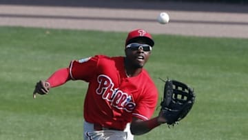 Mar 11, 2016; Lake Buena Vista, FL, USA; Philadelphia Phillies center fielder Roman Quinn (71) catches a pop fly against the Atlanta Braves during the eighth inning at Champion Stadium. Mandatory Credit: Butch Dill-USA TODAY Sports