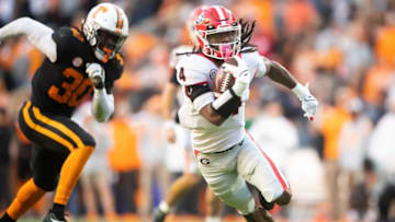 Georgia running back James Cook runs down the field during a football game against Tennessee.(Photo By The Knoxville News-Sentinel)