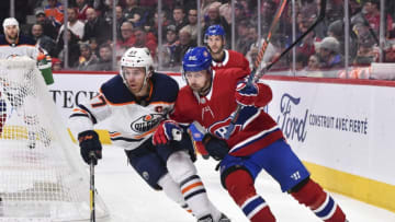 MONTREAL, QC - JANUARY 09: Connor McDavid #97 of the Edmonton Oilers and Tomas Tatar #90 of the Montreal Canadiens skate against each other during the first period at the Bell Centre on January 9, 2020 in Montreal, Canada. The Edmonton Oilers defeated the Montreal Canadiens 4-2. (Photo by Minas Panagiotakis/Getty Images)