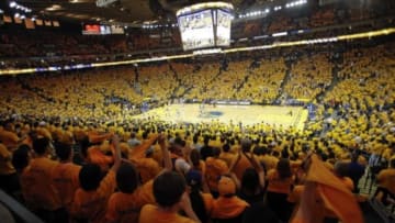 May 2, 2013; Oakland, CA, USA; Golden State Warriors fans celebrate after the play against the Denver Nuggets during the third quarter of game six of the first round of the 2013 NBA Playoffs at Oracle Arena. Mandatory Credit: Kelley L Cox-USA TODAY Sports