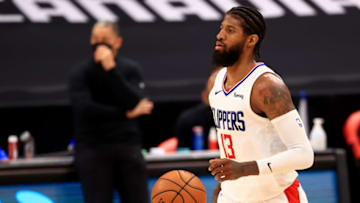 TAMPA, FLORIDA - MAY 11: Paul George #13 of the LA Clippers looks to pass during a game against the Toronto Raptors at Amalie Arena on May 11, 2021 in Tampa, Florida. (Photo by Mike Ehrmann/Getty Images) NOTE TO USER: User expressly acknowledges and agrees that, by downloading and or using this photograph, User is consenting to the terms and conditions of the Getty Images License Agreement.
