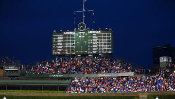 Jul 8, 2015; Chicago, IL, USA; Overall view of the crowd in the outfield grandstands and the scoreboard during the Chicago Cubs game against the St. Louis Cardinals at Wrigley Field. Mandatory Credit: Mark J. Rebilas-USA TODAY Sports