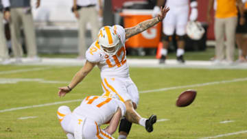 Nov 7, 2020; Fayetteville, Arkansas, USA; Tennessee Volunteers kicker Brent Cimaglia (42) kicks an extra point in the second wearer against the Arkansas Razorbacks at Donald W. Reynolds Razorback Stadium. Mandatory Credit: Nelson Chenault-USA TODAY Sports