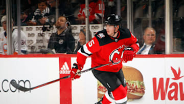 NEWARK, NEW JERSEY - SEPTEMBER 27: Simon Nemec #5 of the New Jersey Devils skates against the New York Islanders at the Prudential Center on September 27, 2022 in Newark, New Jersey. (Photo by Bruce Bennett/Getty Images)