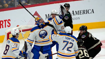 Jan 29, 2022; Glendale, Arizona, USA; Buffalo Sabres goaltender Craig Anderson (41) grabs the puck out of the air in the second period against the Arizona Coyotes at Gila River Arena. Mandatory Credit: Rick Scuteri-USA TODAY Sports