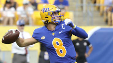 Sep 4, 2021; Pittsburgh, Pennsylvania, USA; Pittsburgh Panthers quarterback Kenny Pickett (8) passes against the Massachusetts Minutemen during the second quarter at Heinz Field. Mandatory Credit: Charles LeClaire-USA TODAY Sports