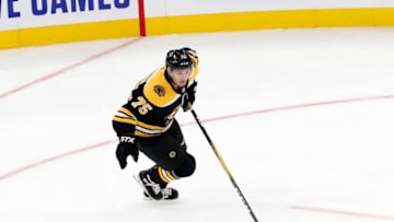 BOSTON, MA - SEPTEMBER 23: Boston Bruins defenseman Connor Clifton (75) starts a rush up ice during a preseason game between the Boston Bruins and the Philadelphia Flyers on September 23, 2019, at TD Garden in Boston, Massachusetts. (Photo by Fred Kfoury III/Icon Sportswire via Getty Images)
