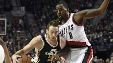 Jan 13, 2016; Portland, OR, USA; Utah Jazz forward Gordon Hayward (20) drives to the basket on Portland Trail Blazers forward Al-Farouq Aminu (8) during the first quarter of the NBA game at the Moda Center at the Rose Quarter. Mandatory Credit: Steve Dykes-USA TODAY Sports