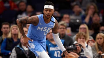 MINNEAPOLIS, MINNESOTA - FEBRUARY 21: D'Angelo Russell #0 of the Minnesota Timberwolves dribbles the ball against the Boston Celtics during the game at Target Center on February 21, 2020 in Minneapolis, Minnesota. NOTE TO USER: User expressly acknowledges and agrees that, by downloading and or using this Photograph, user is consenting to the terms and conditions of the Getty Images License Agreement (Photo by Hannah Foslien/Getty Images)