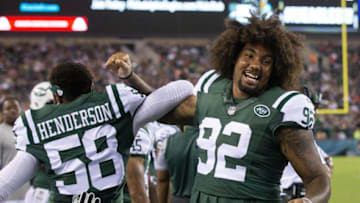 Sep 1, 2016; Philadelphia, PA, USA; New York Jets defensive tackle Leonard Williams (92) and linebacker Erin Henderson (58) react on the sideline during the second half against the Philadelphia Eagles at Lincoln Financial Field. The Philadelphia Eagles won 14-6. Mandatory Credit: Bill Streicher-USA TODAY Sports