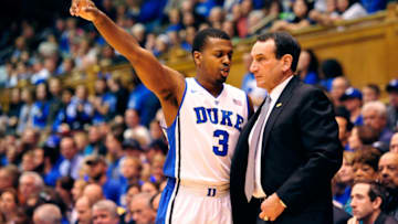 Duke basketball guard Tyler Thornton and head coach Mike Krzyzewski (Photo by Grant Halverson/Getty Images)