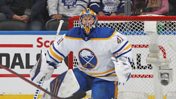 TORONTO, ON - APRIL 12: Craig Anderson #41 of the Buffalo Sabres keeps an eye on a high puck against the Toronto Maple Leafs during an NHL game at Scotiabank Arena on April 12, 2022 in Toronto, Ontario, Canada. The Sabres defeated the Maple Leafs 5-2. (Photo by Claus Andersen/Getty Images)