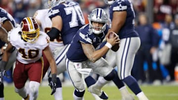 LANDOVER, MD - OCTOBER 21: Dak Prescott #4 of the Dallas Cowboys looks to pass while under pressure against the Washington Redskins in the fourth quarter of the game at FedExField on October 21, 2018 in Landover, Maryland. The Redskins won 20-17. (Photo by Joe Robbins/Getty Images)