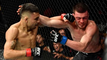 LOS ANGELES, CA - AUGUST 04: (L-R) Alex Perez punches Jose Torres in their flyweight fight during the UFC 227 event inside Staples Center on August 4, 2018 in Los Angeles, California. (Photo by Jeff Bottari/Zuffa LLC/Zuffa LLC via Getty Images)