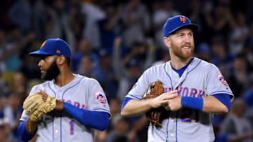 LOS ANGELES, CA - SEPTEMBER 04: Todd Frazier #21 of the New York Mets reacts to his fileding errorin front of Amed Rosario #1, allowing Enrique Hernandez #14 to score, to tie the game 4-4 during the fourth inning at Dodger Stadium on September 4, 2018 in Los Angeles, California. (Photo by Harry How/Getty Images)
