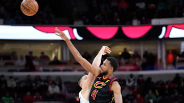 Mar 12, 2022; Chicago, Illinois, USA; Chicago Bulls center Nikola Vucevic (9) and Cleveland Cavaliers center Evan Mobley (4) go for the ball during the first half at United Center. Mandatory Credit: David Banks-USA TODAY Sports