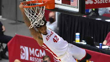 Aug 12, 2021; Las Vegas, Nevada, USA; Atlanta Hawks forward DeVaughn Akoon-Purcell (42) hangs on the rim after dunking against the Philadelphia 76ers during an NBA Summer League game at Cox Pavilion. Mandatory Credit: Stephen R. Sylvanie-USA TODAY Sports