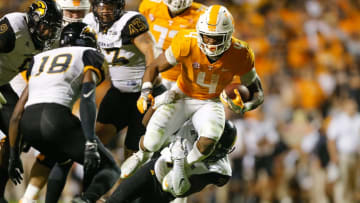KNOXVILLE, TN - NOVEMBER 04: John Kelly #4 of the Tennessee Volunteers runs with the ball against the Southern Miss Golden Eagles during the second half at Neyland Stadium on November 4, 2017 in Knoxville, Tennessee. (Photo by Michael Reaves/Getty Images)