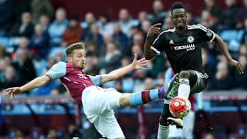 BIRMINGHAM, ENGLAND - APRIL 02: Baba Rahman of Chelsea is tackled by Jordan Lyden of Aston Villa during the Barclays Premier League match between Aston Villa and Chelsea at Villa Park on April 2, 2016 in Birmingham, England. (Photo by Ross Kinnaird/Getty Images)