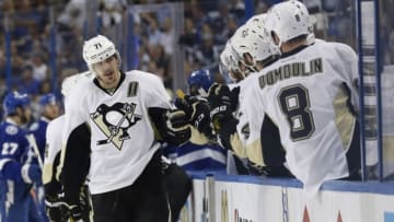 May 20, 2016; Tampa, FL, USA; Pittsburgh Penguins center Evgeni Malkin (71) is congratulated by teammates after he scored a goal against the Tampa Bay Lightning during the third period of game four of the Eastern Conference Final of the 2016 Stanley Cup Playoffs at Amalie Arena. Tampa Bay Lightning defeated the Pittsburgh Penguins 4-3. Mandatory Credit: Kim Klement-USA TODAY Sports